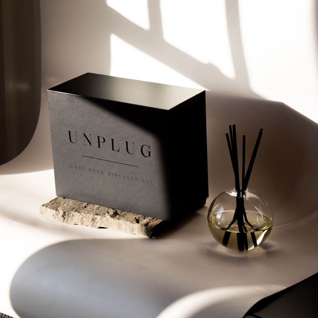 Luxe reed diffuser with elegant black packaging