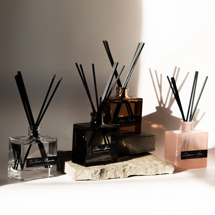 Set of diffusers on a light surface with a neutral background