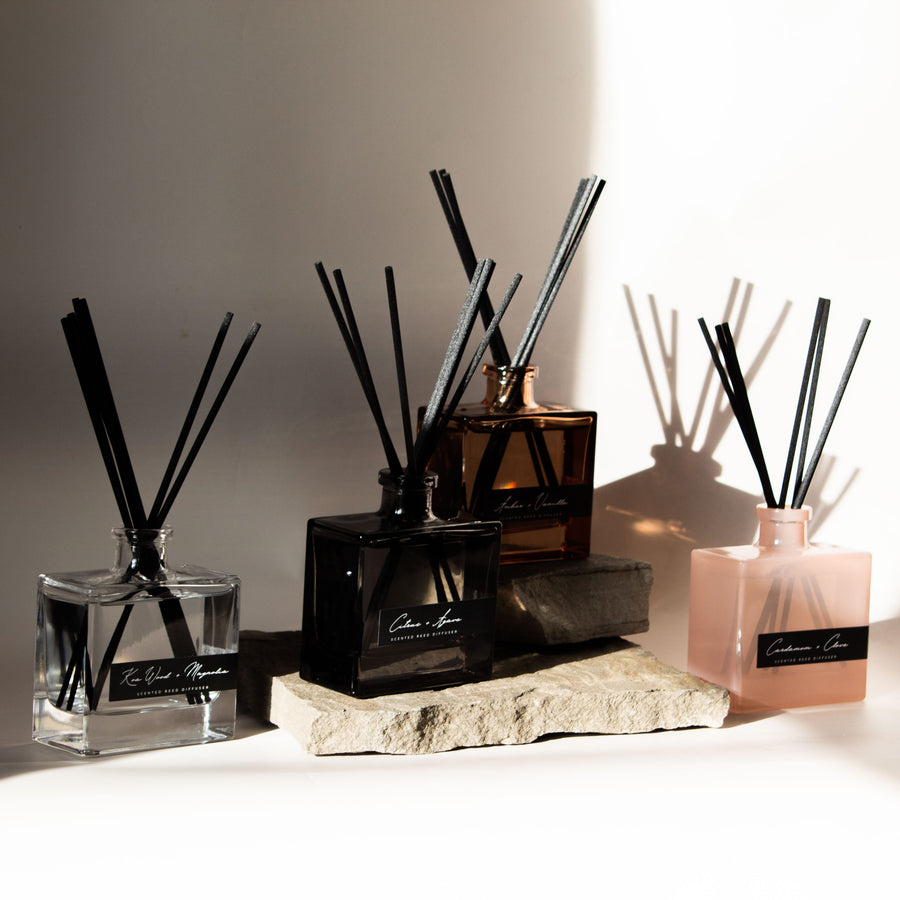 Set of diffusers on a light surface with a neutral background