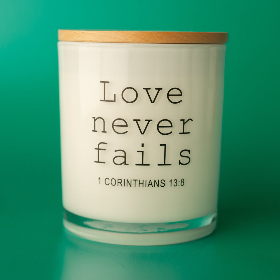 LOVE NEVER FAILS CANDLE