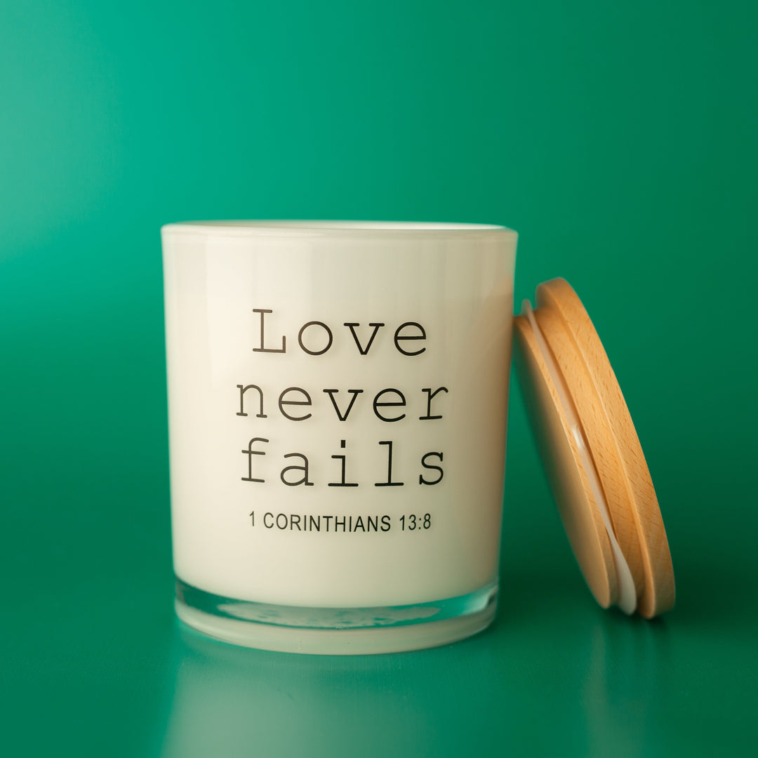 LOVE NEVER FAILS CANDLE
