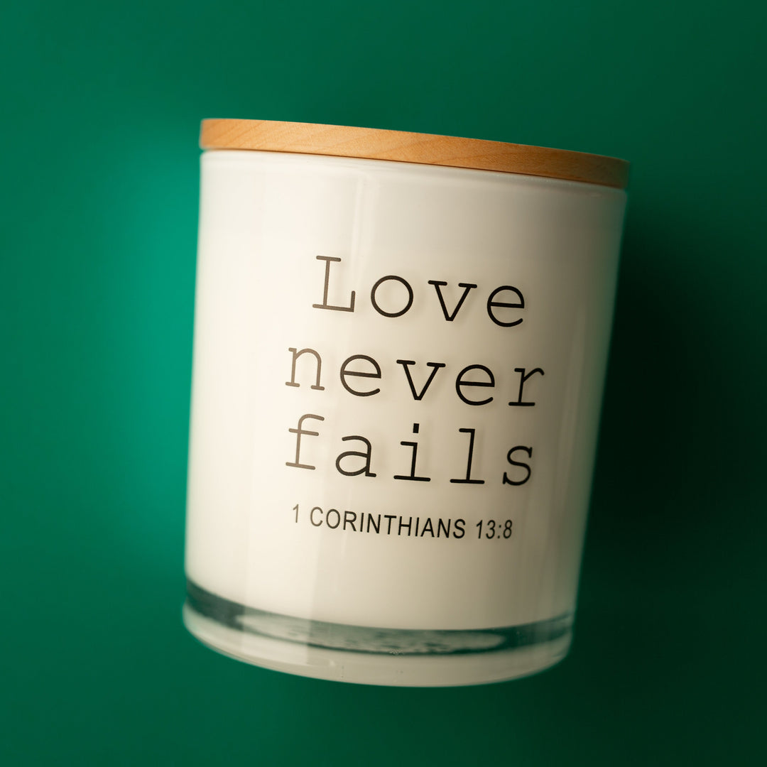 LOVE NEVER FAILS CANDLE