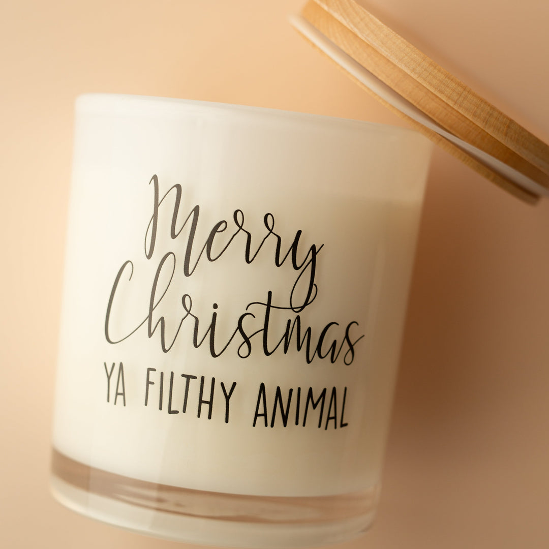 MERRY CHRISTMAS YA FILTHY ANIMAL CANDLE