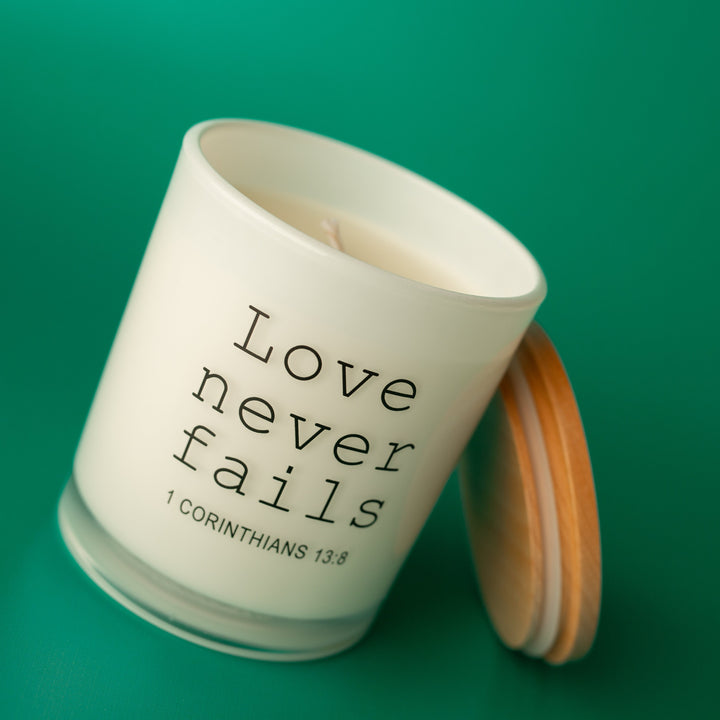 LOVE NEVER FAILS CANDLE