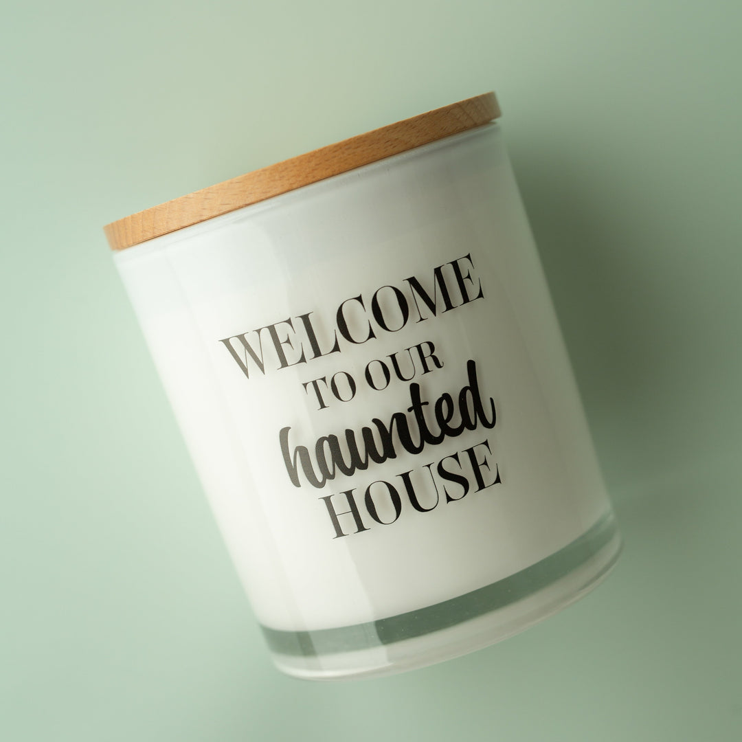 WELCOME TO OUR HAUNTED HOUSE CANDLE