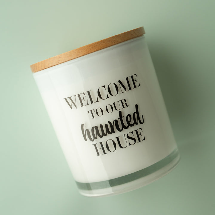 WELCOME TO OUR HAUNTED HOUSE CANDLE