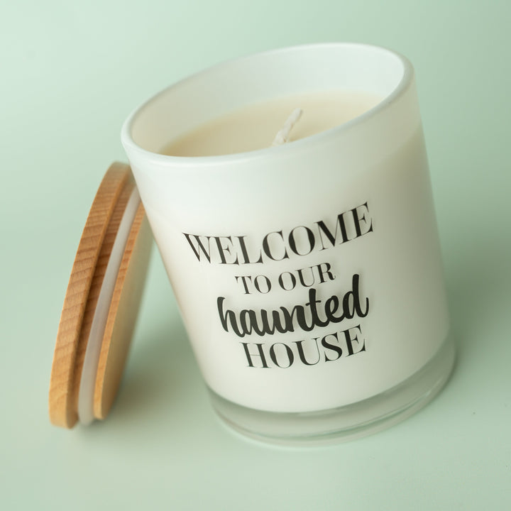WELCOME TO OUR HAUNTED HOUSE CANDLE