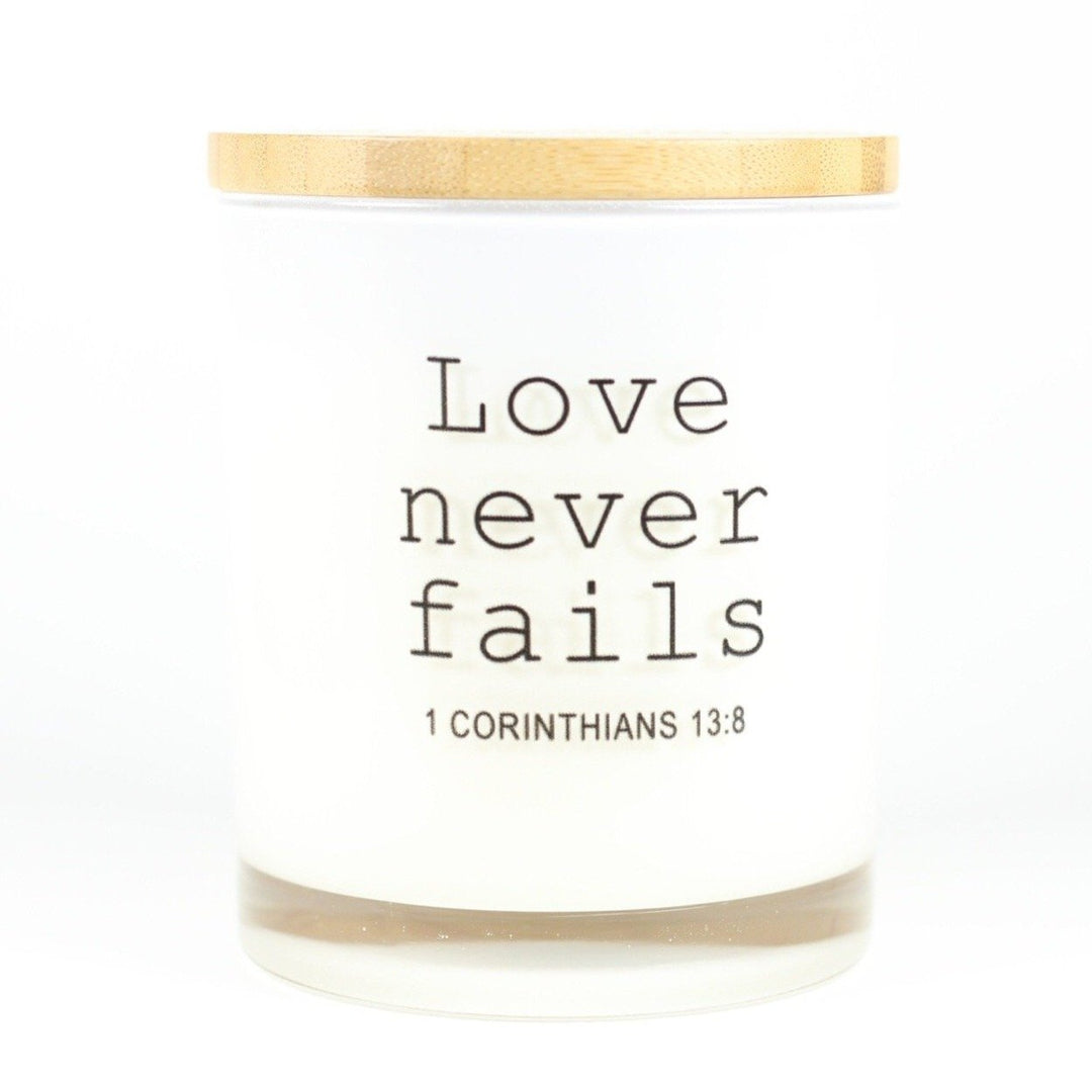 LOVE NEVER FAILS CANDLE